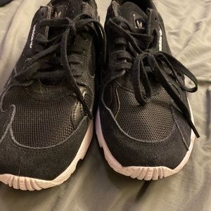 Black and white adidas sneakers. Worn twice. Lots of life left.